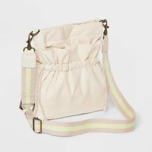 Target crossbody purse. Size 12wide x 12long. Strap is light green and cream.